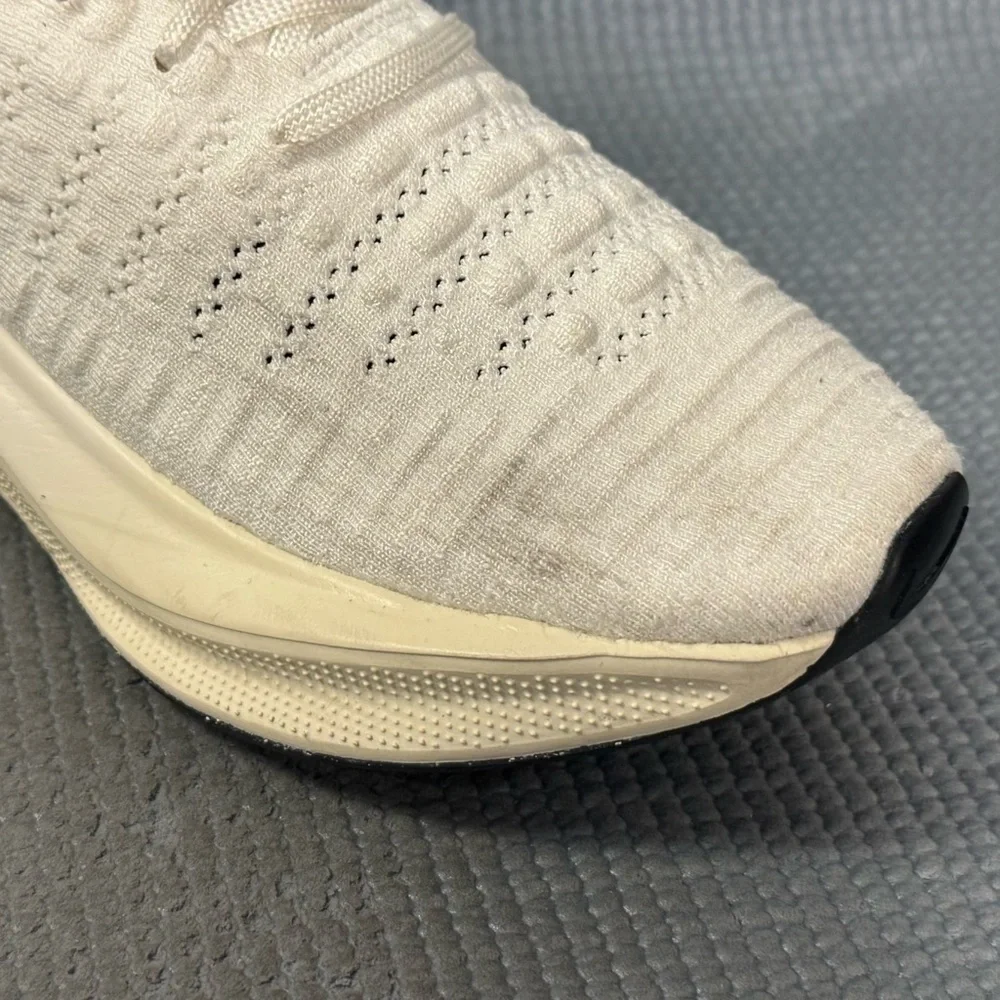 Nike Women's White Cream Running Shoes with Black Swoosh